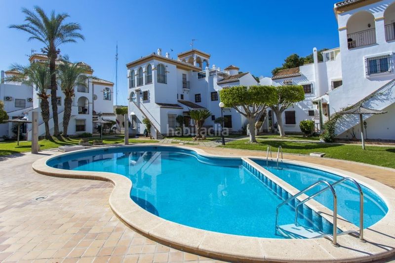 Foto accc6091-28c7-425b-b7de-bd015bf7c6a9. Casa amb aparcament a Playa Flamenca Orihuela