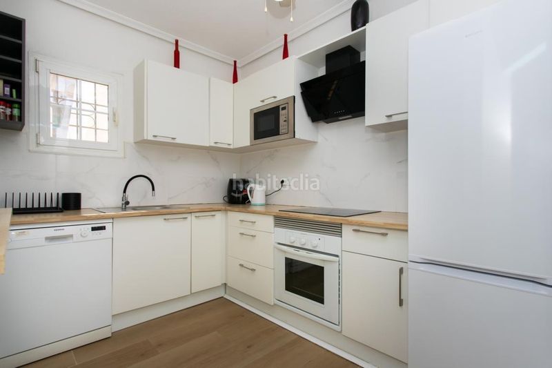 Foto aeb2a653-de2c-46f1-98dd-a9751f4da3a7. Casa amb aparcament a Playa Flamenca Orihuela