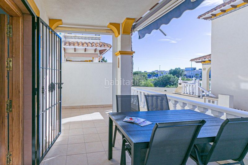 Foto afc8d319-34ff-4ed7-a1d6-f561988d1db2. Casa amb aparcament a Playa Flamenca Orihuela