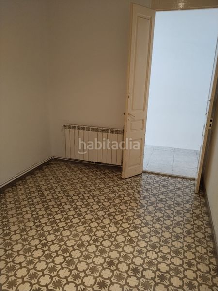Foto 0e16d883-fb31-4142-acf8-d77670067ec6. Casa adossada amb xemeneia calefacció a Centre Rubí