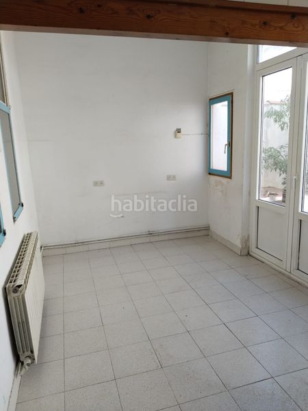 Foto 6b201586-49d5-4e03-98d0-8cc398a0f574. Casa adossada amb xemeneia calefacció a Centre Rubí