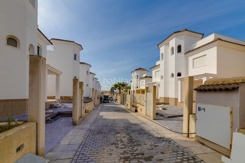 Foto b69195ac-97c5-4a11-b8cc-252e6ea57a71. Casa aparellada amb aparcament piscina a San Fulgencio