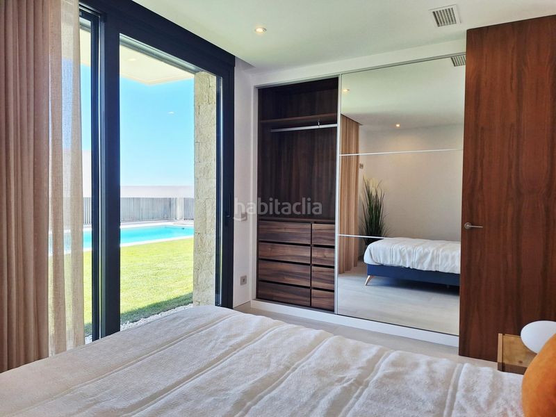 Foto 5947f9f2-fffe-4d29-a7df-1bd7698f87a8. Xalet amb aparcament piscina a Golf Bahía Finestrat
