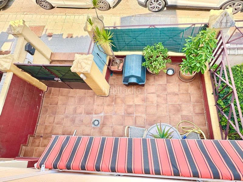 Foto 4909e0ce-4c5b-41fa-985c-a2cb084bc7b1. Casa aparellada amb aparcament piscina a Benajarafe