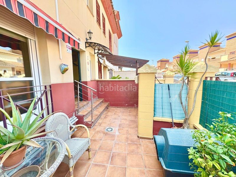 Foto 849e4527-fc78-4141-8717-16587b644f34. Casa aparellada amb aparcament piscina a Benajarafe