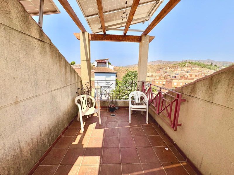 Foto 97b0d145-c3f7-493f-8f30-4120c27c7dd2. Casa aparellada amb aparcament piscina a Benajarafe