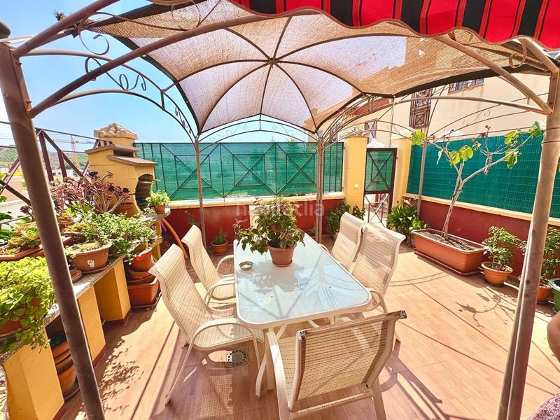 Foto abdd8a1c-85e4-4e62-a612-36a01d79a355. Casa aparellada amb aparcament piscina a Benajarafe