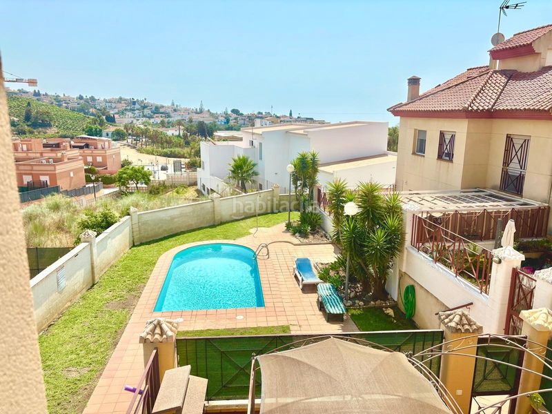 Foto ace6f10b-d7a1-4e4c-b12d-aacf5d0d46ea. Casa aparellada amb aparcament piscina a Benajarafe
