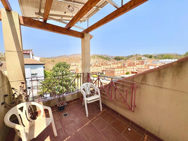 Foto dd774c06-f818-4a9f-a017-fb81bae49ca4. Casa aparellada amb aparcament piscina a Benajarafe