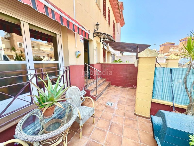 Foto faf7ba35-e378-4b15-9405-376c4684cfd9. Casa aparellada amb aparcament piscina a Benajarafe