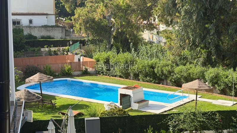 Foto 8023979a-dc37-4ba6-a88d-1b9e12ac7e51. Casa adossada amb aparcament piscina a Benajarafe