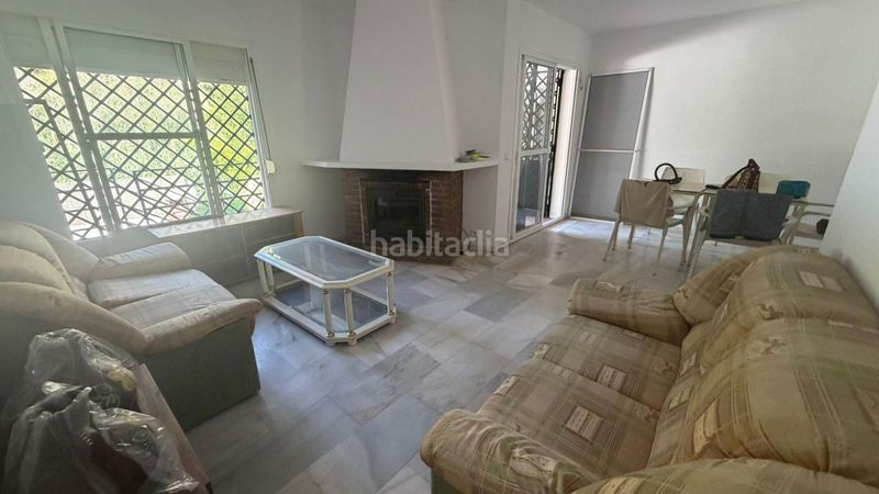 Foto c57d076a-c124-45c0-94b1-46cff73e3e04. Casa adossada amb aparcament piscina a Benajarafe