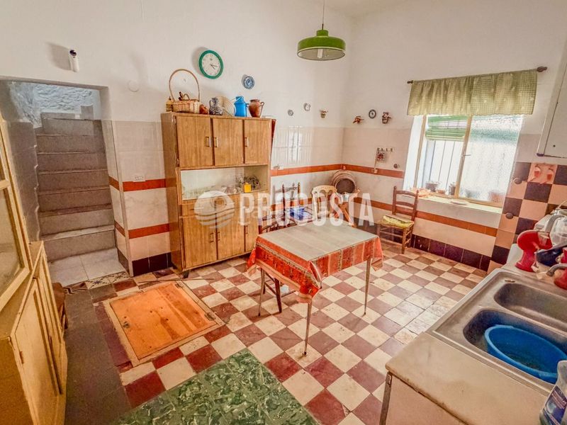 Foto ddd0f202-6a81-4a06-9c65-a0bdd553bbba. Casa adossada a Ítrabo