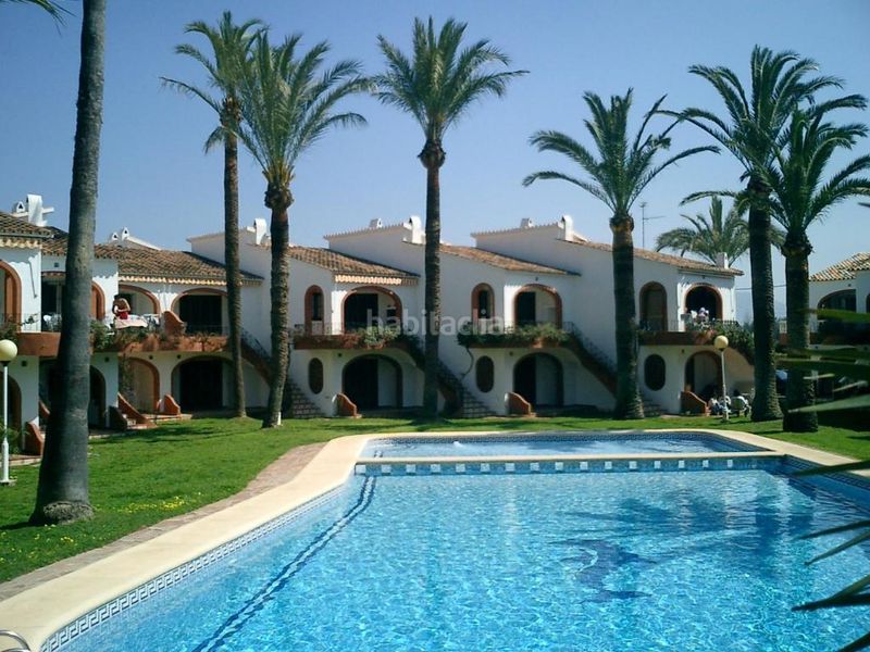 Foto b67fda85-1a06-4944-88a2-7631c862cd8b. Casa adossada amb aparcament piscina a L'Almadrava - L'Estanyó Dénia