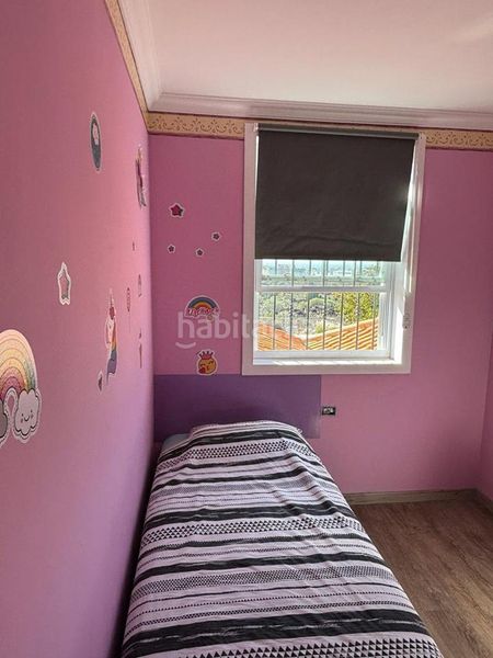 Foto 3c5687c0-89b3-43dd-a744-d6a74b0e53c3. Casa aparellada amb aparcament a Las Rosas Arona