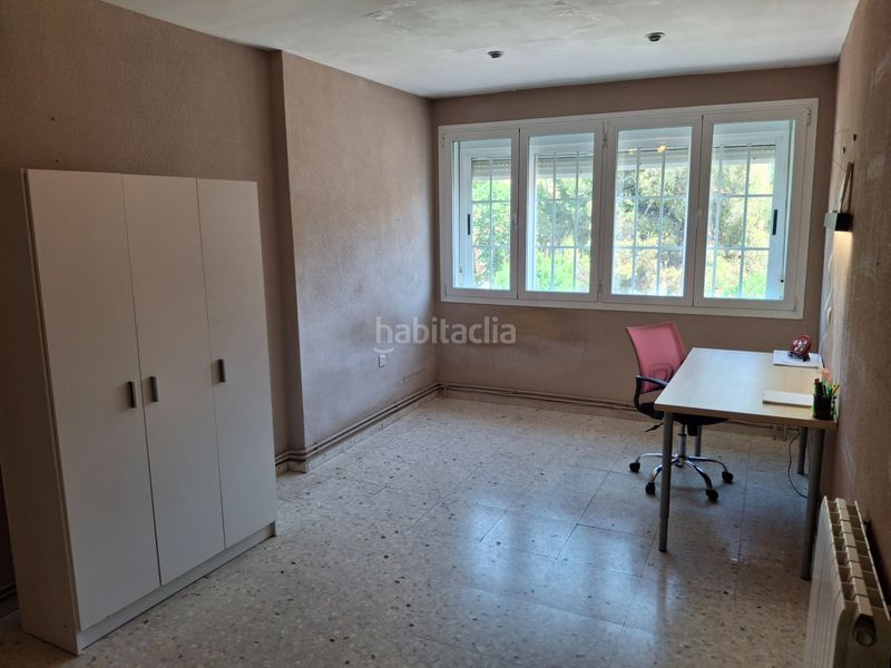 Foto 0e8f6335-8b8f-4eb1-a2f5-317500d23f9a. Casa adossada amb calefacció aparcament a Larache Ciudad Real