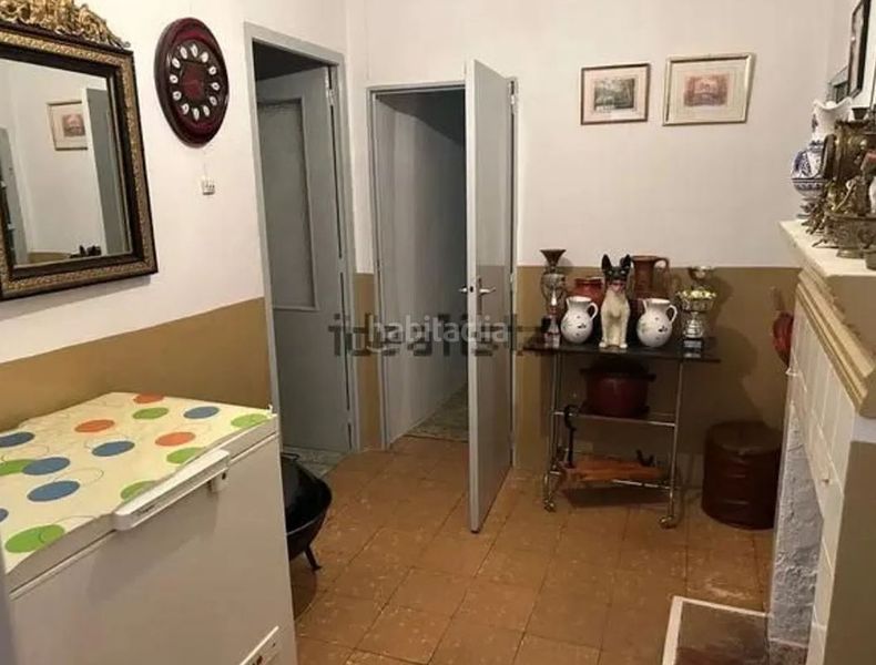 Foto 1716bcb7-f03f-4e6c-86bd-981df95ad2a8. Casa amb xemeneia calefacció a Malagón