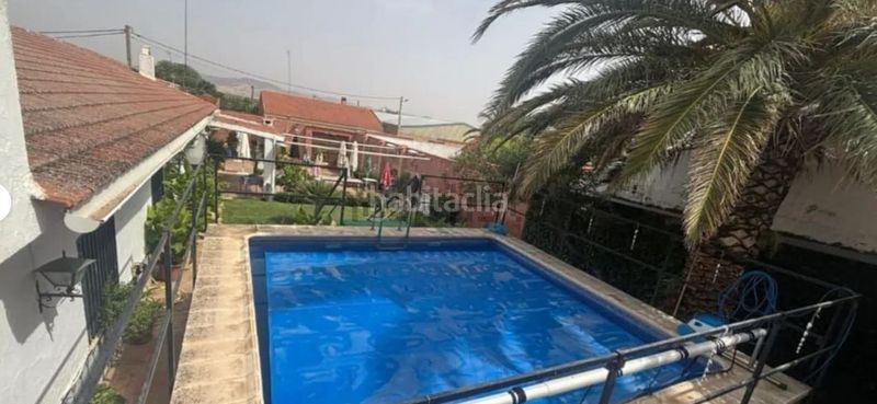 Foto 699e1119-c387-4bb8-abc6-e3ea51a628a3. Xalet amb xemeneia calefacció aparcament piscina a Malagón
