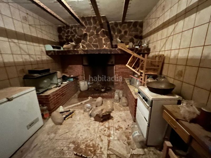 Foto cb1bff56-a357-4e65-b9d0-da521e61ff04. Casa amb xemeneia aparcament a Malagón