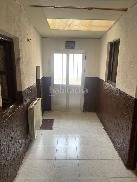 Foto af009bc3-79c7-462f-ac4f-4a130815ba08. Casa amb xemeneia aparcament a Malagón