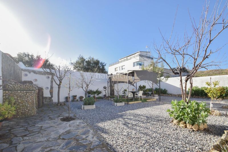 Foto f315e325-c510-4ccd-97b6-e77610bc764c. Casa amb aparcament a Atarfe