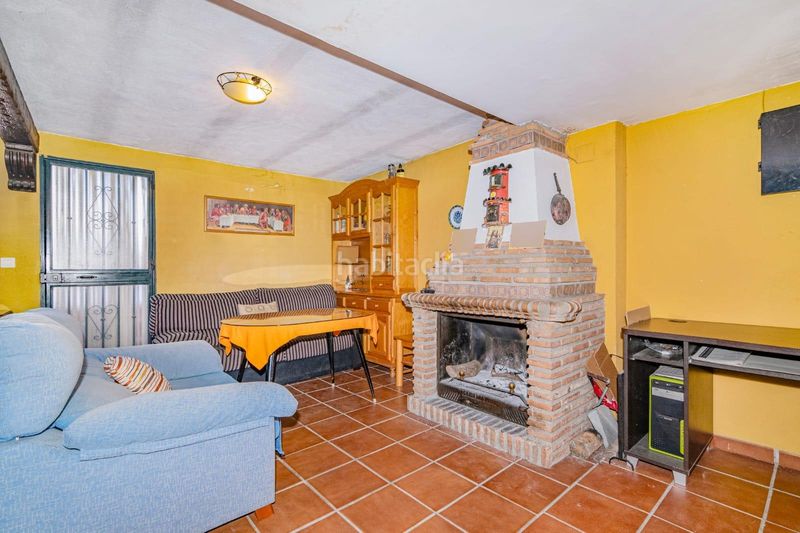 Foto a62cc511-2c00-426f-b0a0-89d39a292e7b. Casa adossada amb aparcament piscina a Cúllar Vega