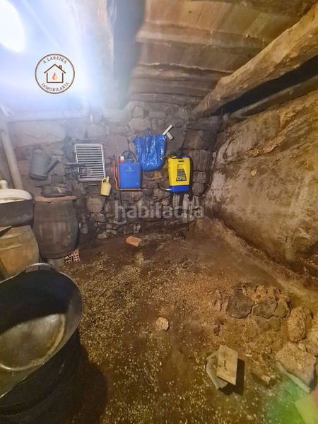 Foto 23a05927-6efb-4f95-bf43-850f8655e72e. Casa adossada a Lobios