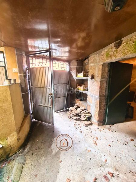 Foto 76d03dd3-c2e1-4d76-9ec5-17353a2dc9a3. Casa adossada a Lobios