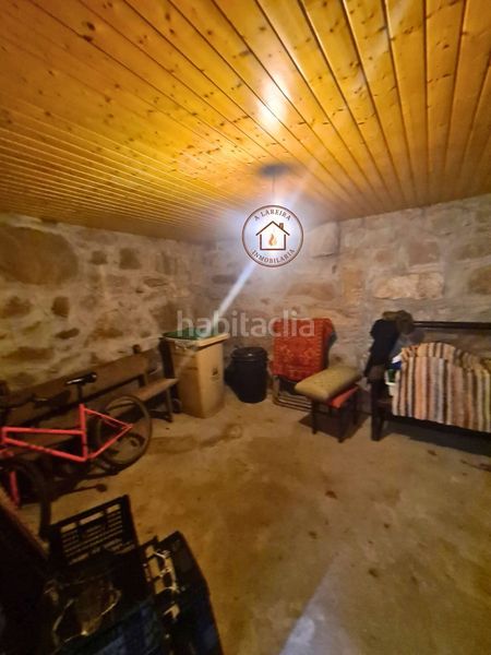 Foto 84c5d6a4-ee9f-47a9-9ad4-3b290a9a198a. Casa adossada a Lobios