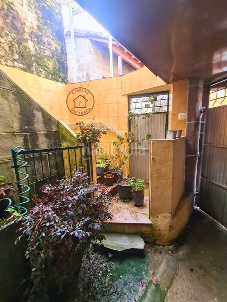 Foto b2a3de70-c97d-4b90-8b19-fc21e80edbb2. Casa adossada a Lobios