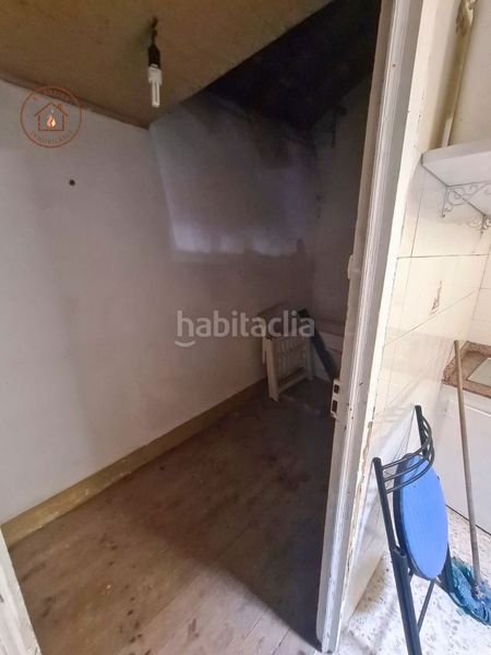 Foto b5e41f50-9662-40d8-8765-a0a40d5621a6. Casa adossada a Lobios