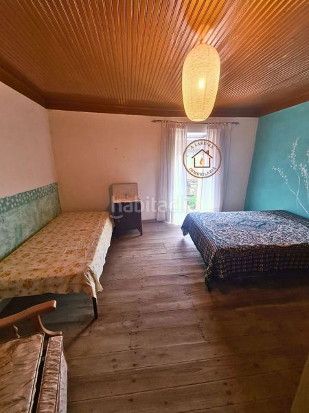 Foto f5286423-0324-4cd6-92e1-e55dd48ca60a. Casa adossada a Lobios