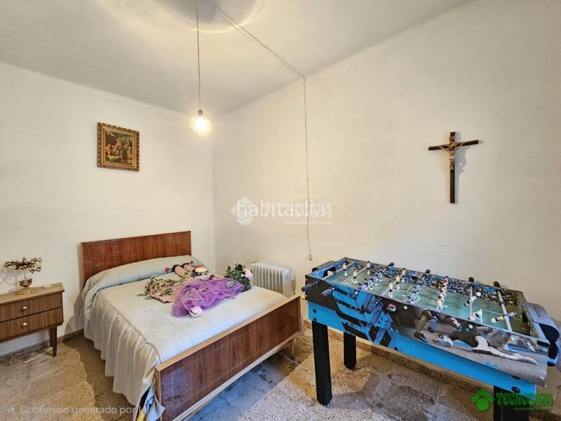 Foto c67126ba-2bf2-49bb-961c-2f514c011e45. Casa aparellada a Balazote