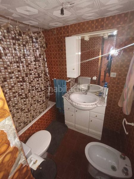 Foto 17e39fbe-f908-4239-8f1f-3dbd1d1586f0. Casa adossada amb xemeneia a Baza