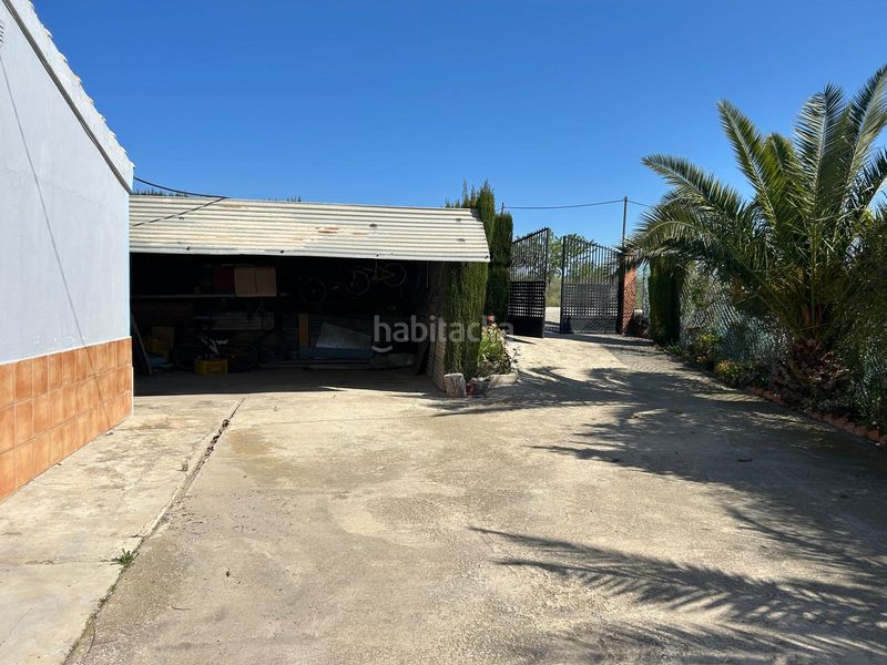 Foto 9c2dbf92-b00e-4c69-b877-fef29f6fc1c0. Masia amb xemeneia aparcament piscina a Bullas