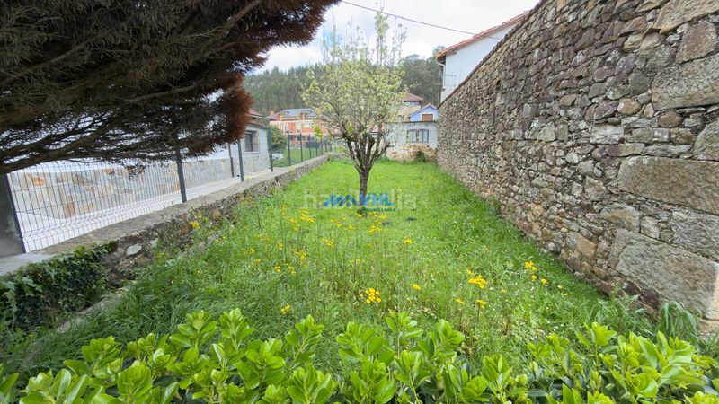 Foto ae76c318-c956-4f67-b90c-ea2bac1d0194. Casa adossada amb xemeneia a Guriezo