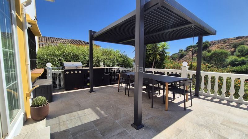 Foto a7cd275a-fd93-4114-bb83-fb5d09600c14. Casa amb aparcament piscina a Riviera del Sol Mijas
