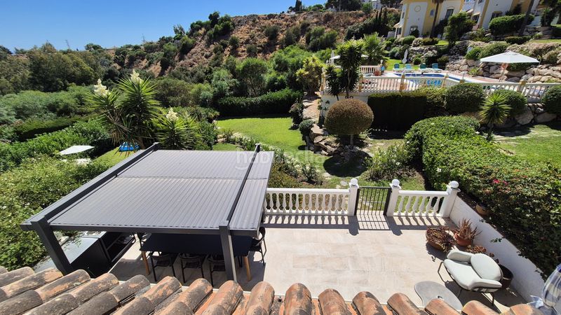 Foto f200a7d8-704b-4601-9e0a-93a96aa83dd5. Casa amb aparcament piscina a Riviera del Sol Mijas