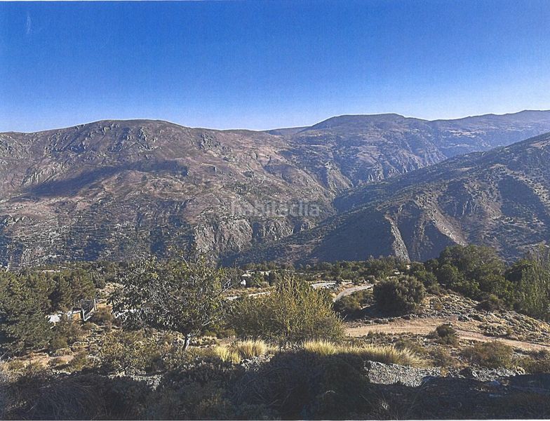 Foto 23f5caf1-d833-4c12-a289-e3441dd97c36. Terreno residenziale in Güéjar Sierra