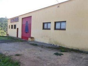 Fabrikhalle in N/a. Zona industria, nave y terrenos