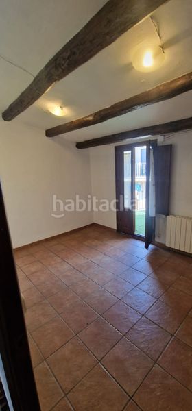 Foto 984b4116-d7d7-4d90-9b4e-40103ed02ce9. Casa adossada amb xemeneia calefacció a Moià