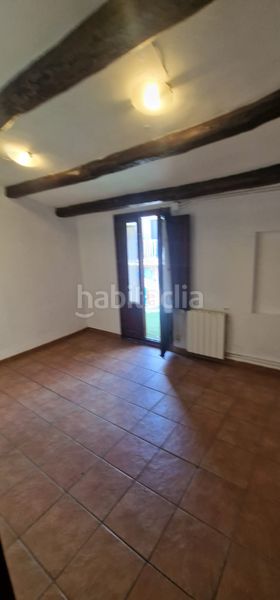 Foto b4080b0d-0e8a-478c-95ca-375d57632b17. Casa adossada amb xemeneia calefacció a Moià