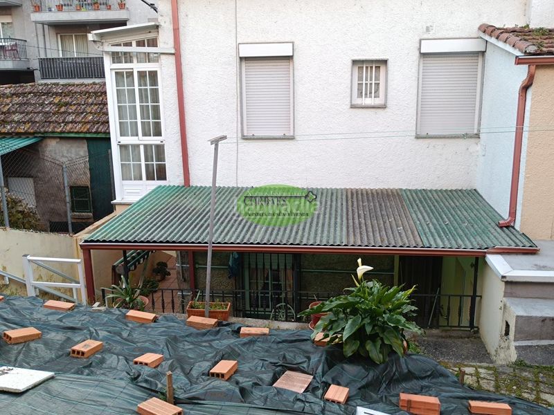 Foto 0fd6e4a8-fb22-4288-9bc2-09c4196b4f3f. Casa adossada amb calefacció aparcament a Barrocanes Ourense