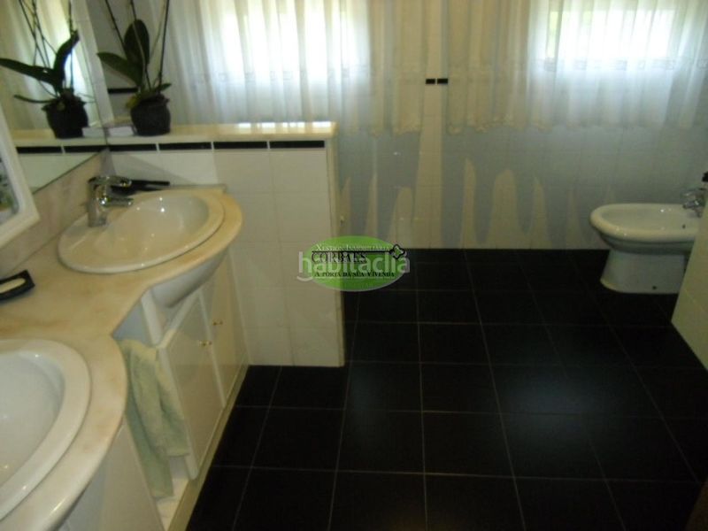 Foto 3d6652f9-54de-4327-a7c9-b9c4edf0e949. Casa amb calefacció aparcament a As Lagoas Ourense