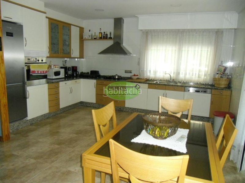 Foto 401f51cd-5ccb-4c67-8afa-fec91117c990. Casa amb calefacció aparcament a As Lagoas Ourense