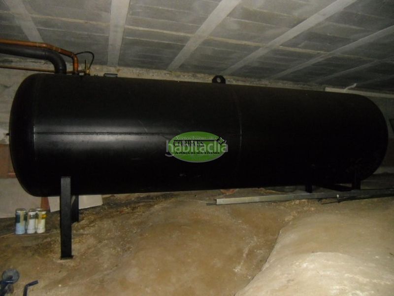 Foto 7a4c1cbc-d3f1-4467-849e-71610aadc970. Casa amb calefacció aparcament a As Lagoas Ourense