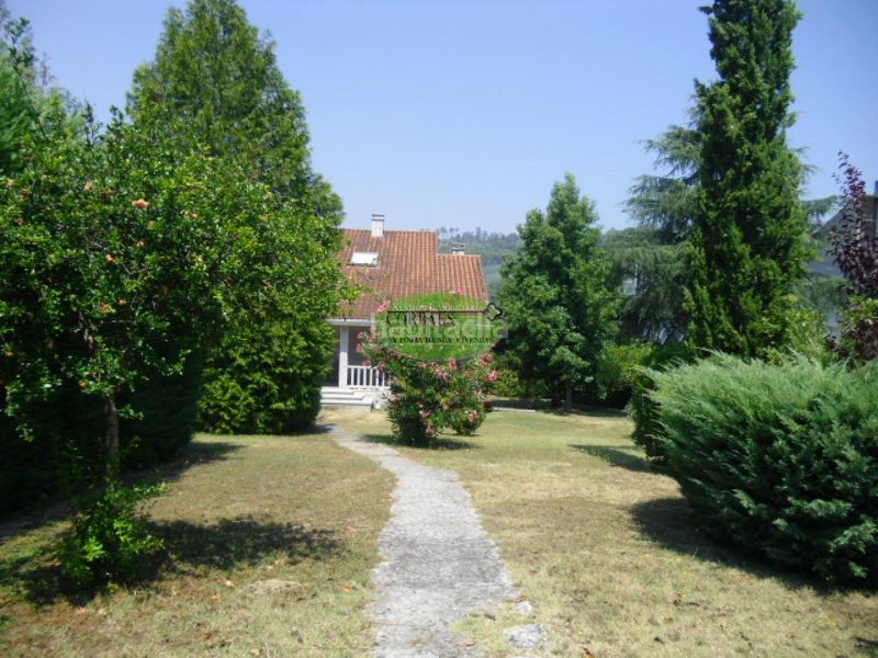 Foto ba358c15-f680-4a8a-a2eb-98ddd98d9322. Casa amb calefacció aparcament a As Lagoas Ourense