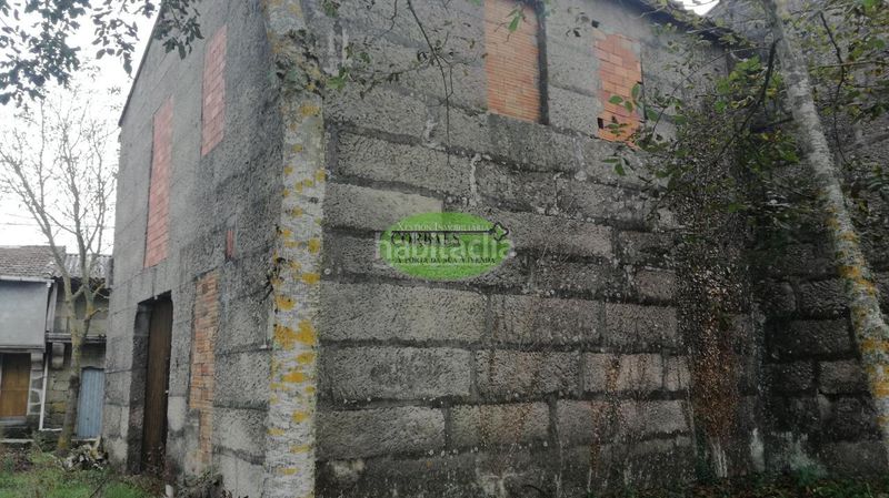 Foto 137d2f58-cef1-4eb4-b2bb-ee4f558ae20c. Casa a Xunqueira de Ambía