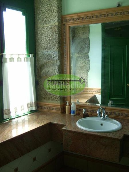Foto f467864d-7f9b-45f4-840b-ca525c98d9b7. Haus mit heizung in Leiro