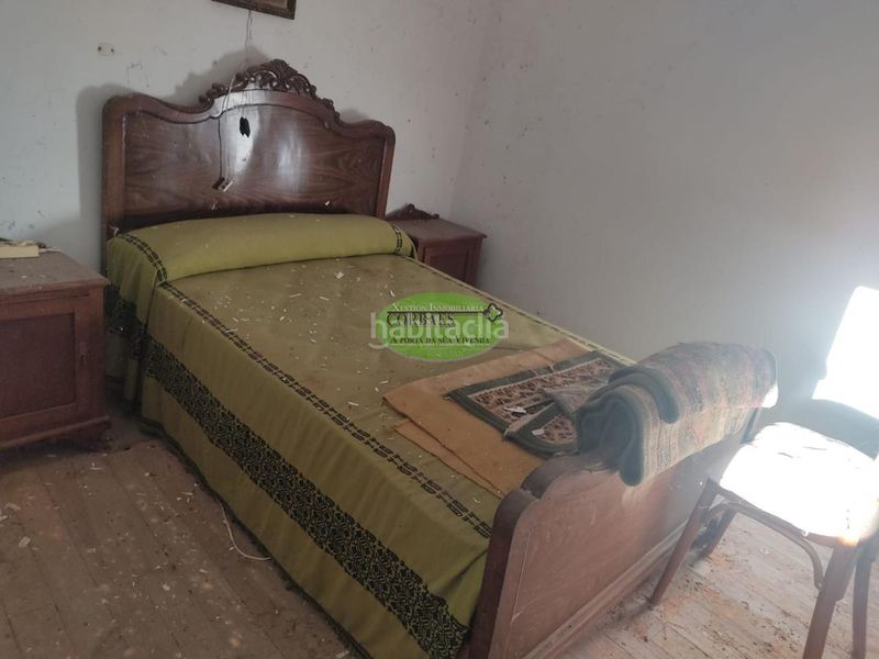 Foto f10c500b-856e-4572-af95-ba6a14965a36. Maison dans Amoeiro